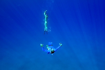 Snorkeller swims through bubble ring, Big Island, Hawaii, United States of America, Pacific