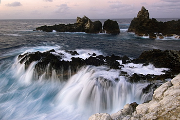 Wave crashing over rock, St. Peter and St. Paul's rocks, Brazil, South America