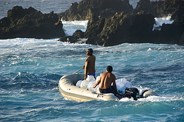 Skiff transporting water, St. Peter and St. Paul's rocks, Brazil, South America