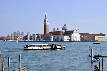 Ferry commutes between Piazza San Marco and San Giorgio Maggiore Island, Venice, UNESCO World Heritage Site, Veneto, Italy, Europe