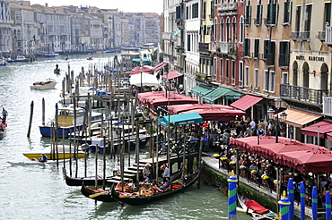 Waterfront and gondolas on the Grand Canal seen from Rialto Bridge, Venice, UNESCO World Heritage Site, Veneto, Italy, Europe