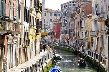 Old buildings built over canals and gondolas in Venice, UNESCO World Heritage Site, Veneto, Italy, Europe