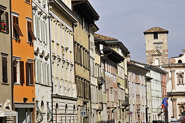 Historical buildings follow along main street of Trento, Trentino, Italy, Europe