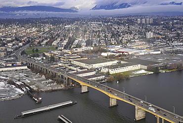 Aerial view of Oak Street Bridge, Fraser River, Vancouver and mountain range, British Columbia, Canada, North America