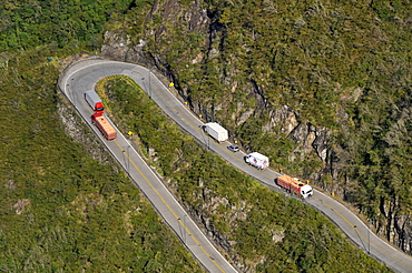 Trucks and sinuous road at Serra do Rio do Rastro, Lauro Muller, Santa Catarina, Brazil, South America