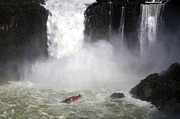 Macuco safari speed boat heading into Salto San Martin, Iguassu falls, Iguazu National Park, UNESCO World Heritage Site, Puerto Iguazu, Argentina, South America