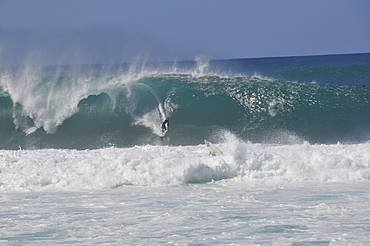 Surfers riding famous barrel waves, Oahu, Hawaii, United States of America, Pacific