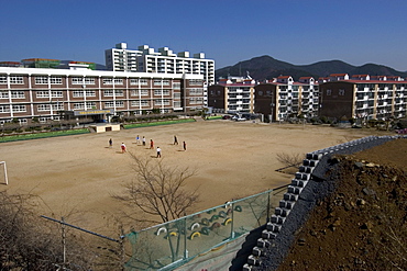 Soccer pitch and school, Geoje-Do, South Korea, Asia