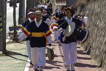 Peace demonstrators walking in traditional costumes, Geoje-Do, South Korea, Asia