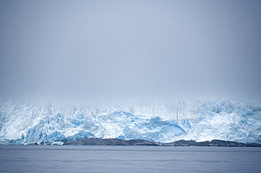 View over the sea to iceberg. Svalbard, Norway       (rr)