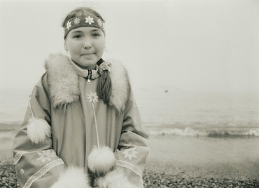 2008; Inuit Settlement with local girl in traditional clothes, Lorino Village (Chukotskiy Peninsular) Russia, Asia.