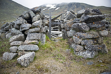 Semyon Dezhnev settlement, abandoned and ruined, Cape Dezhnev (Chukotskiy Peninsular ) Russia, Asia.  MORE INFO: cape that forms the easternmost mainland point of Eurasia. In 1898 it was officially renamed Cape Dezhnev, replacing Captain James Cook's 'East Cape', in honor of Semyon Dezhnyov, the first recorded European to round it (1648). There is a large monument to Dezhnev on the coast.