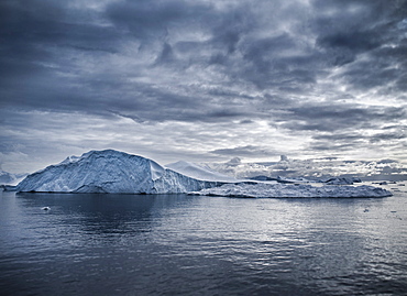 Icebergs and zodiacs in Disko Bay, Ilulissat, Jakobshavn, Qaasuitsup, Greenland (Denmark), North America