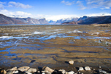 Mountain and Harbour of Pangnitung, low tide. Cape Dyer, Baffin Island, Canada, North America