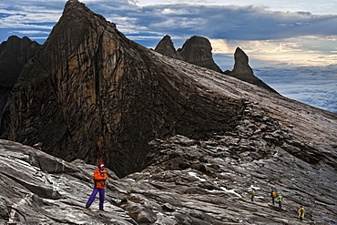 Tourist climbing to the summit of Mount Kinabalu. Kinabalu National Park, Sabah, Borneo, Asia