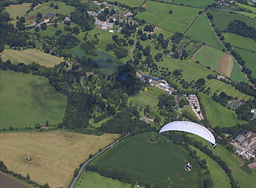 aerial views  of Paramotoring over the countryside in Devon UK