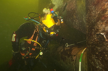 Commercial diver working underwater, Fort William, Scotland, United Kingdom, Europe