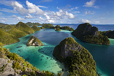 Aerial view of lagoon and karst limestone formations in Wayag Island, Raja Ampat, West Papua, Indonesia, Southeast Asia, Asia