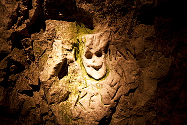 Chalk carving of face in hand-dug tunnel, Hell-Fire Caves, West Wycombe, Buckinghamshire, England, United Kingdom, Europe