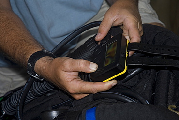 Technical Divers setting up rebreather computer for technical diving equipment, Divetech, Grand Cayman, Cayman Islands, Caribbean