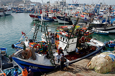 Fishing boat preparing to set sail from Tangier fishing harbour, Tangier, Morocco, North Africa, Africa