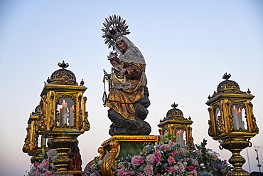 The Virgen del Carmen on her float that will take her to the Santuario near Tarifa in the evening of her excursion to sea, Tarifa, Cadiz, Andalusia, Spain, Europe