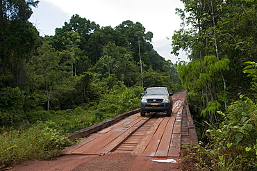 Crossing a bridge on the main highway through Guyana's rainforest, Guyana, South America