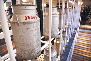 Milk churns in the cheese factory, Volendam, North Holland Province, The Netherlands (Holland), Europe