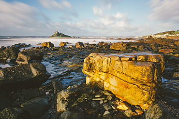 Rocky shoreline and St. Michaels Mount, early morning, Cornwall, England, United Kingdom, Europe 