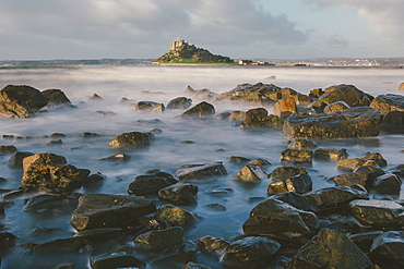 Rocky shoreline and St. Michaels Mount, early morning, Cornwall, England, United Kingdom, Europe 