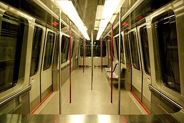 The ultra modern vancouver underground Airport Shuttle, whizzes through the tunnel, sleek and vacant of any human activity. Vanocuver, BC, Canada