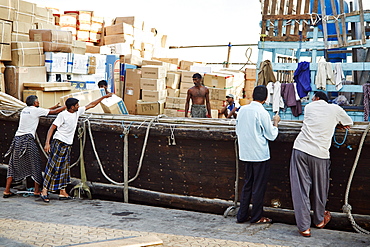 Free-trade port Dubai Creek, with dhows piled high with a range of goods, Dubai, United Arab Emirates, Middle East