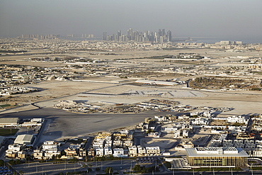 Aerial view from the Aspire Tower viewing platform of Downtown Doha with its skyscrapers in the distance, Doha, Qatar, Middle East