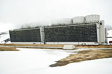 Krafla Geothermal Power Station, the largest in Iceland with a distinctive cooling tower reminiscent of a cheese grater, Krafla, Iceland, Polar Regions