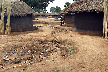 An IDP camp (internally displaced people) in Te-Tugu district of Northern Uganda has been created to accommodate the mass of Ugandan refugees fleeing the LRA (Lords Resistance Army) who are fighting the Ugandan government and its people.  Although accommodation is basic- mainly mud huts, they are impeccably maintained, instilling a real sense of pride in the community. Te-Tugu, Uganda, East Africa