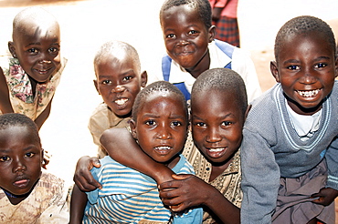 Young residents enjoy smiling in front of camera, Gulu Town, Northwest Uganda. Gulu Town, Uganda, East Africa