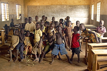 An IDP camp (internally displaced people) in Amuru district of Northern Uganda has been created to accommodate the mass of Ugandan refugees fleeing the LRA (Lords Resistance Army) who are fighting the Ugandan government and its people.  Inside one of the classrooms, the children are more interested in the camera than study. Amuru, Uganda, East Africa