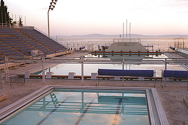 Hotel Jadran was once one of the world's most prestigious water polo clubs. The pool is still used by teams from around the world to train when they come to Europe.  Captured in the failing light of the evening sun, set against the Mediterranean sea, the pools still occupy an element of majesty. Split, Croatia