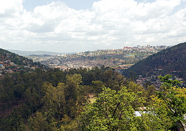 Spanning several Hills, Kigali, the capital City of Rwanda.  Here you can see the City Centre with the Adjacent hills filling up with housing for the ever increasing population. Kigali, Rwanda, East Africa