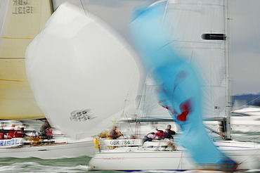 Action dropping the Spinnaker at Skandia Cowes Week 2008 Finish Line