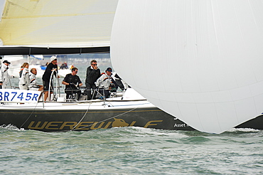 Action dropping the Spinnaker at Skandia Cowes Week 2008 Finish Line