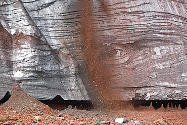 Close up views of glacial ice and ash after the 1969 eruption on Deception Island in Antarctica. Note how the ash is suspended within the ice itself. Here ash is falling from the flow above.