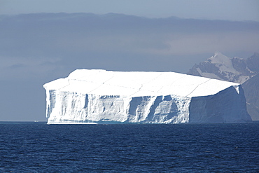 A massive tabular iceberg off the coast of Elephant Island in the South Shetland Island Group, Antarctica.