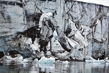 A view of Storpollen Glacier, on the southwestern side of Spitsbergen Island in the Svalbard Archipelago, Barents Sea, Norway.