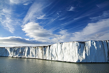 Late evening views of the Negrebreen Glacier melting in the sunlight on Spitsbergen Island in the Svalbard Archipelago, Barents Sea, Norway.