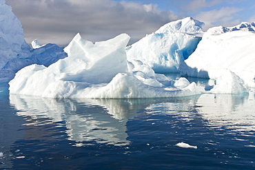 Iceberg detail in and around the Antarctic Peninsula during the summer months. More icebergs are being created as global warming is causing the breakup of major ice shelves and glaciers.