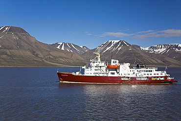 The tour vessel Polar Star leaving the town of Longyearbyen on the west side of  Spitsbergen Island in the Svalbard Archipelago in the Barents Sea, Norway. 