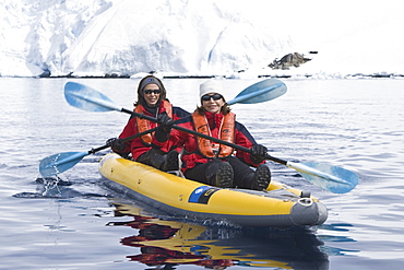 Lindblad Expeditions guests kayaking among the ice in Antarctica as part of expedition travel. NO MODEL RELEASES FOR THIS IMAGE.