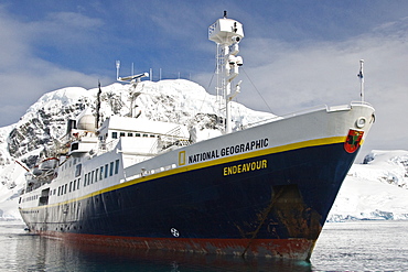 The Lindblad expedition ship National Geographic Endeavour operating with it's fleet of Zodiacs in and around the Antarctic peninsula, Antarctica.