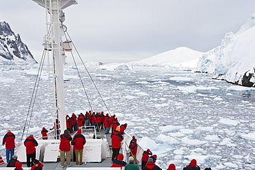 Views of the scenic Lemaire Channel on the west side of the Antarctic peninsula in Antarctica. Shown here is the National Geographic Endeavour navigating the channel through ice floes in late spring.